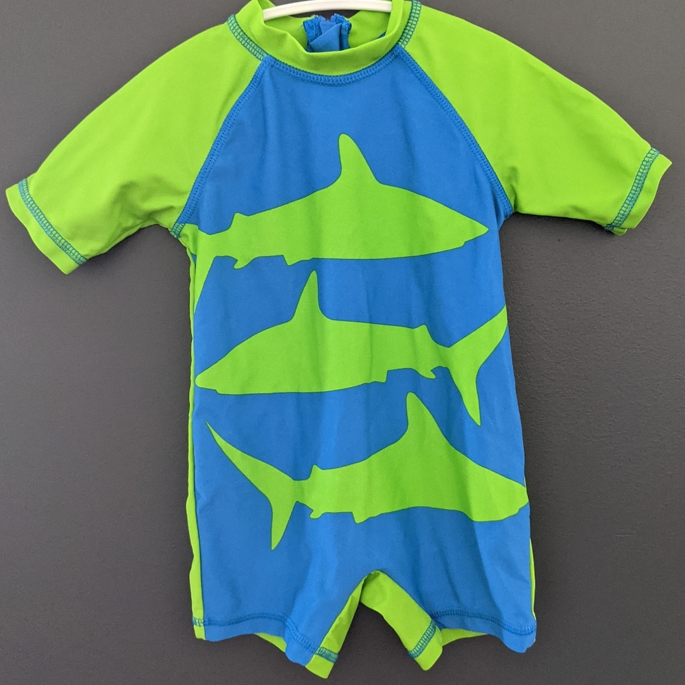 Blue and green shark print short sleeved rashguard